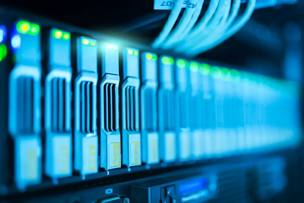 Server rack array with blue indicator lighting